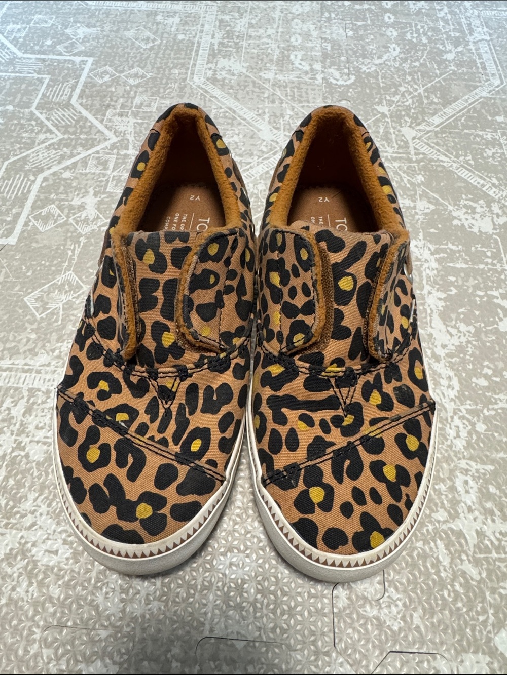 Toms Kids Leopard Print Slip-On Sneakers in Brown and Black with Yellow Accents